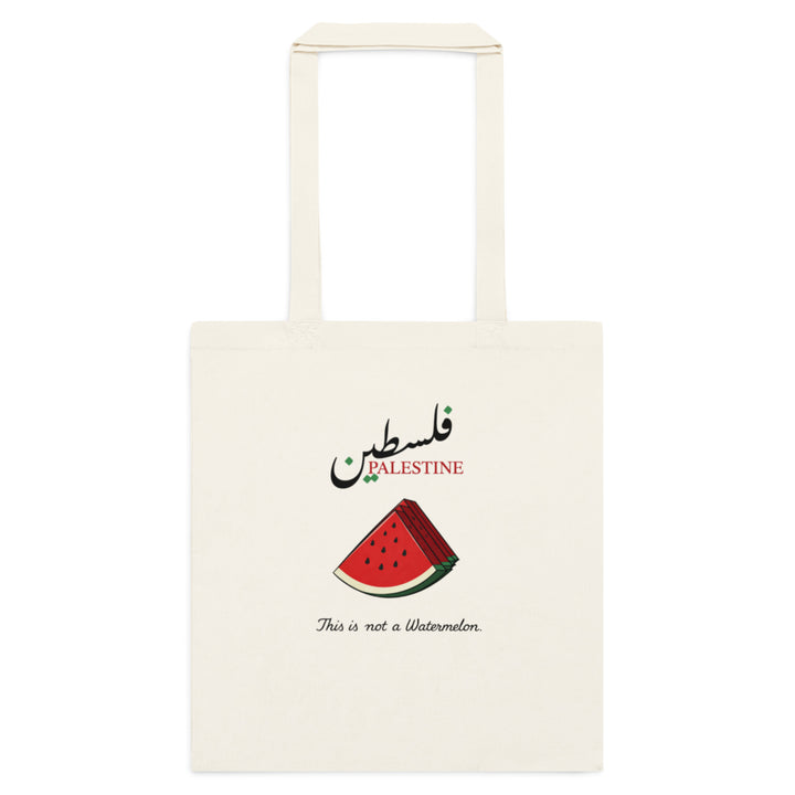 Tote bag Palestine écru présenté de face, avec inscription en arabe, motif pastèque et longues anses.